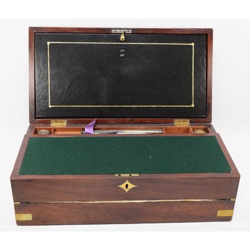 237 - A 19th century mahogany and brass bound twin handled writing slope, opening to reveal pull down hing... 