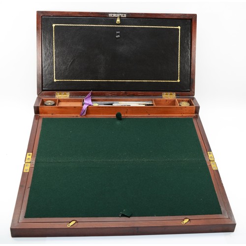 237 - A 19th century mahogany and brass bound twin handled writing slope, opening to reveal pull down hing... 