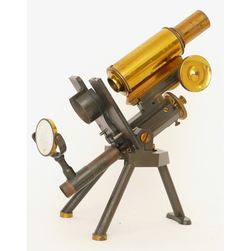 242 - J. Swift & Son; a 20th century brass and black Japanned  microscope, with plano-concaved mirror, rai... 