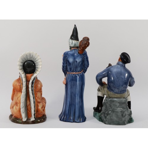 253 - Royal Doulton; three porcelain figures The Chief HN2892, The Wizard HN2877 and The Lobster Man HN231... 