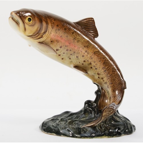 264 - Beswick; a painted porcelain trout, impressed 1032 and black marks to base, 17cm high.