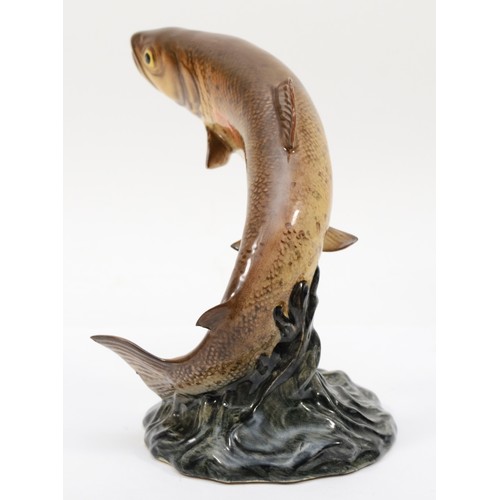 264 - Beswick; a painted porcelain trout, impressed 1032 and black marks to base, 17cm high.