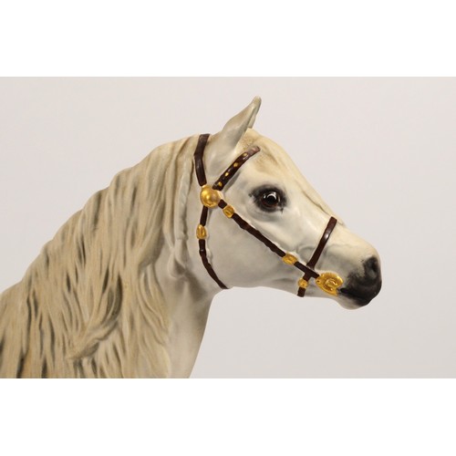 265 - Beswick; three 20th century porcelain horses comprising of Connoisseur model of Champion, Welsh Moun... 