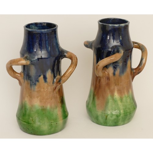 274 - A pair of early 20th century possibly Belgian drip glaze vases  in blue, brown and green with three ... 