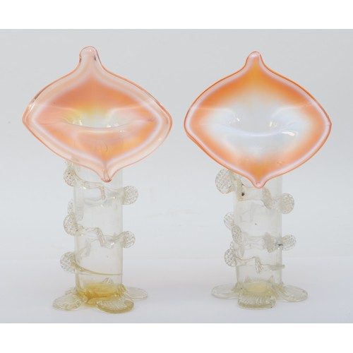 279 - A pair of Victorian glass Jack in the Pulpit vases, with applied decoration, each raised on four spl... 