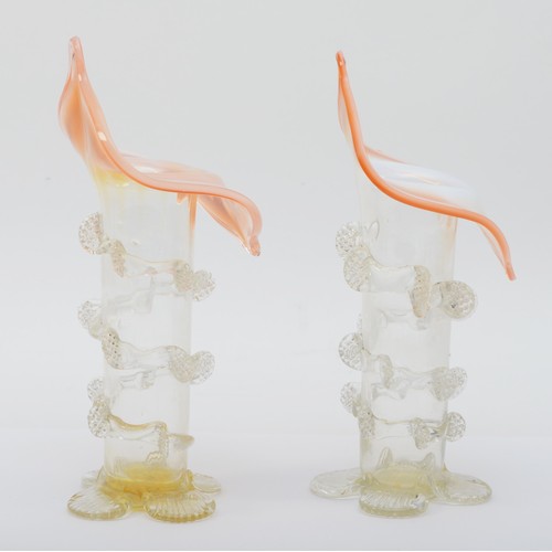 279 - A pair of Victorian glass Jack in the Pulpit vases, with applied decoration, each raised on four spl... 