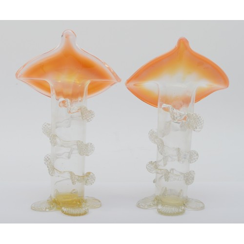 279 - A pair of Victorian glass Jack in the Pulpit vases, with applied decoration, each raised on four spl... 