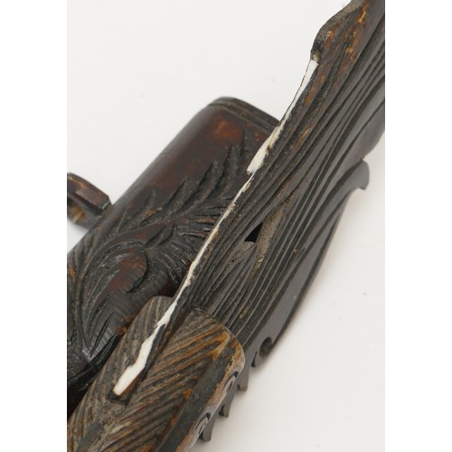 285 - A Chinese carved and incised resin ceremonial staff in the form a dragon, 85cm long