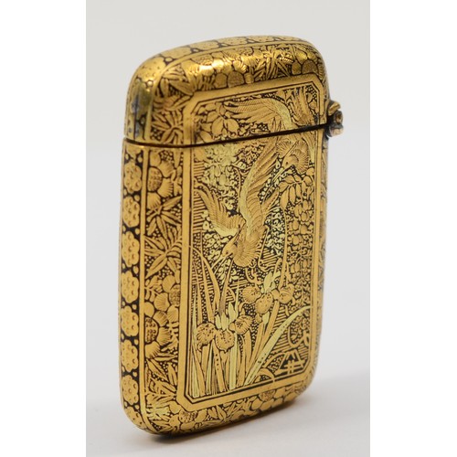 287 - A Japanese Meiji period inlaid two tone vesta case, in the style of the Komai company of Kyoto, with... 