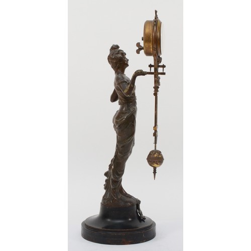 305 - A 20th century novelty bronzed spelter mystery clock in the form of a classical maiden, raised on ci... 