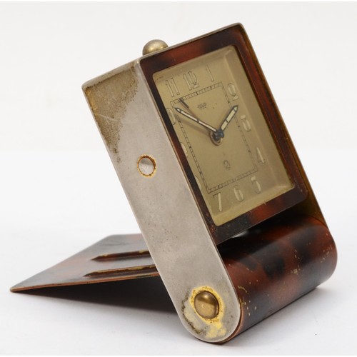 315 - Jaeger, an Art Deco brass tortoiseshell effect folding travelling alarm clock, the dial with Arabic ... 