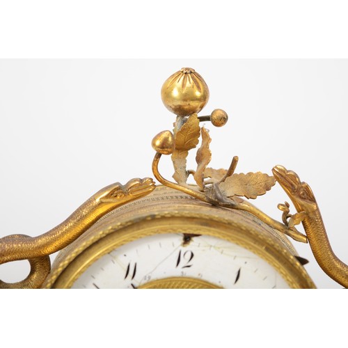 316 - A 19th century gilt brass striking and calendar mantle clock, the white enamel chapter ring with bla... 