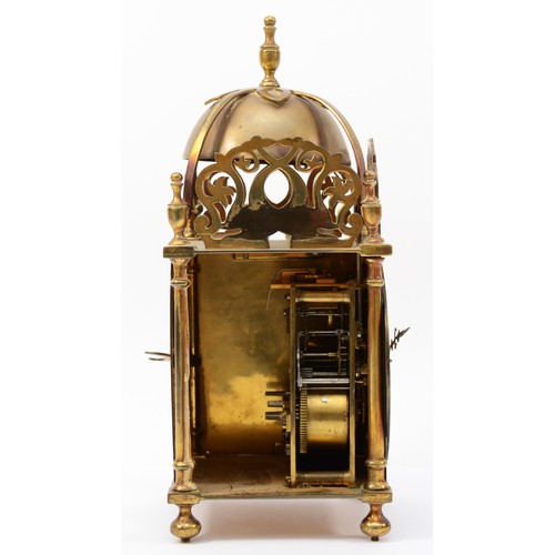 318 - A brass lantern clock, early 20th century, striking on a bell, with pierced fretwork decoration, the... 