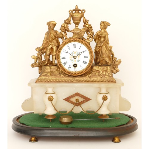 319 - A late 19th century French gilt metal and marble drumhead mantle clock, surmounted with a man and wo... 