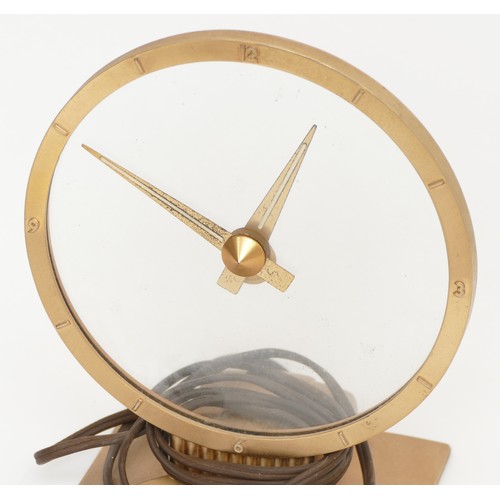 320 - Jefferson Golden Hour electric mystery clock, with brushed brass hands, bezel and base and glass fac... 