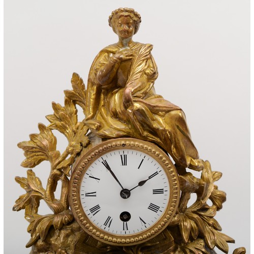 322 - A 19th century French gilt metal drumhead mantle clock, surmounted with a classical maiden and leaf ... 