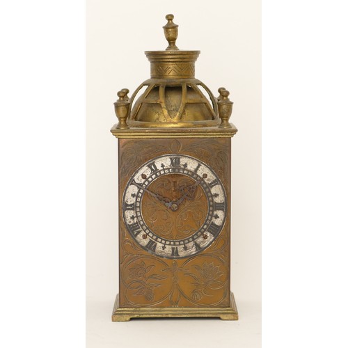 323 - An engraved brass cased mantle clock, the Swiss lever escapement movement striking on a bell with pi... 