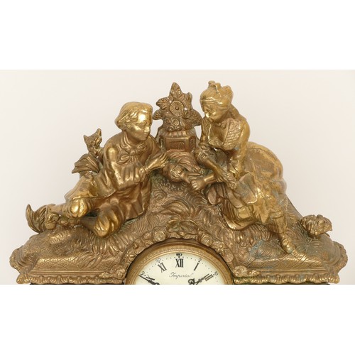 326 - Imperial; a 20th century gilt brass cased mantle clock, the German movement striking on a bell, cast... 