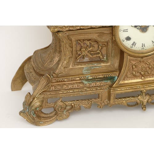 326 - Imperial; a 20th century gilt brass cased mantle clock, the German movement striking on a bell, cast... 