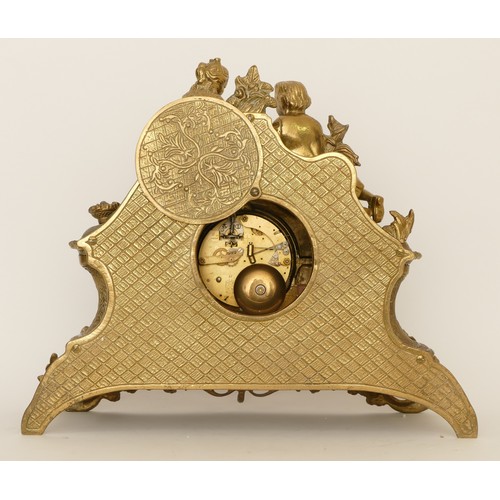 326 - Imperial; a 20th century gilt brass cased mantle clock, the German movement striking on a bell, cast... 