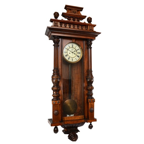 328 - Gustav Becker, a 19th century walnut cased two weight Vienna wall clock, the glass door opening to r... 