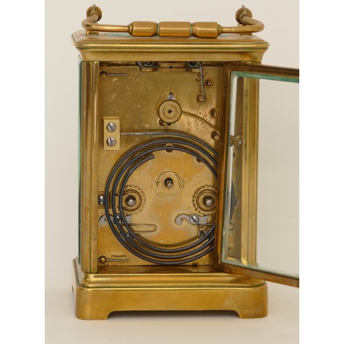 331 - Mappin & Webb; a 20th century brass corniche cased hourly striking carriage clock, strikes on a gong... 