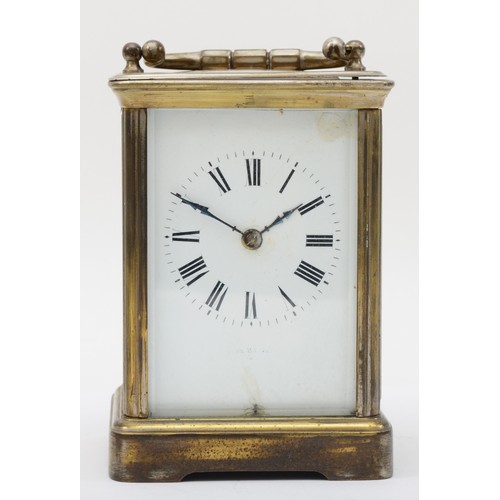 333 - A 20th century brass corniche cased hourly striking carriage clock, the white dial with black Roman ... 