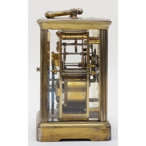 333 - A 20th century brass corniche cased hourly striking carriage clock, the white dial with black Roman ... 