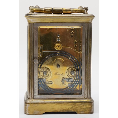 333 - A 20th century brass corniche cased hourly striking carriage clock, the white dial with black Roman ... 