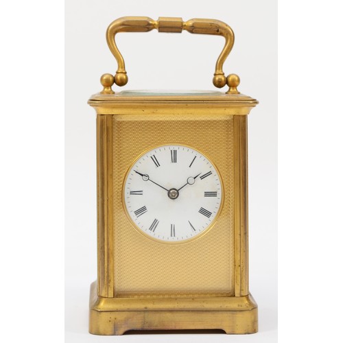 335 - A 20th century brass corniche cased striking carriage clock, striking on the half hour, with applied... 