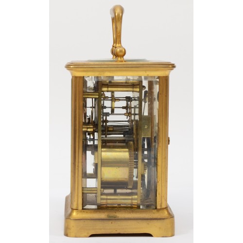 335 - A 20th century brass corniche cased striking carriage clock, striking on the half hour, with applied... 