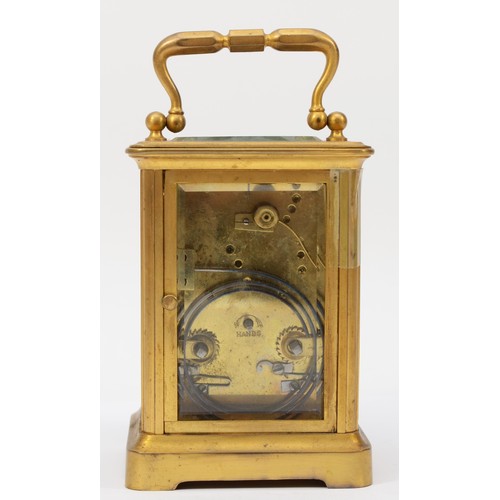 335 - A 20th century brass corniche cased striking carriage clock, striking on the half hour, with applied... 