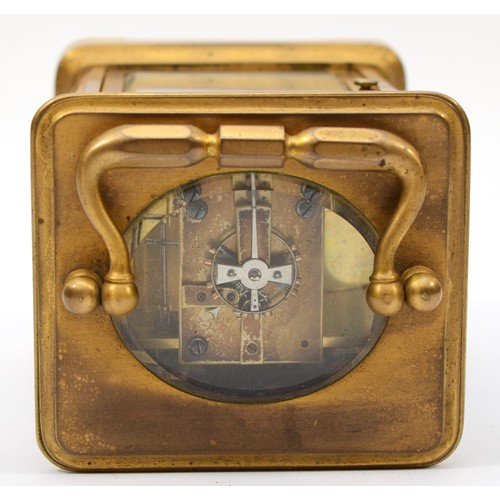 335 - A 20th century brass corniche cased striking carriage clock, striking on the half hour, with applied... 