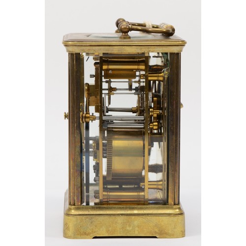 336 - A 20th century brass corniche cased half hourly striking carriage clock, the white dial with black R... 