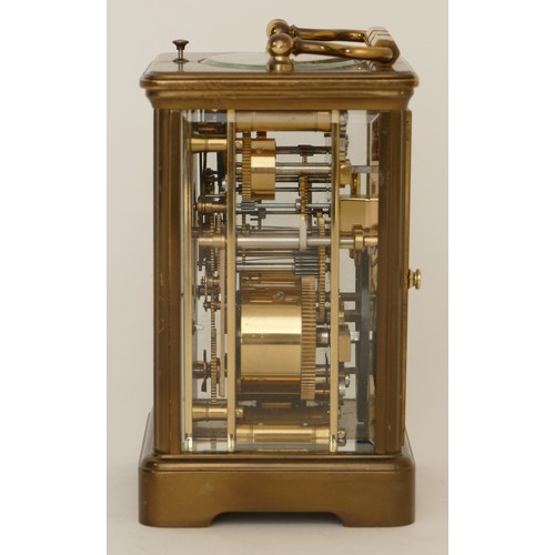 337 - Rapport, a 20th century French brass corniche cased striking alarm carriage clock, the white dial wi... 