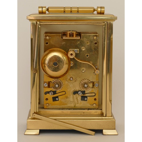 338 - Shortland Bowen, an English brass corniche cased carriage clock, half hourly striking on a bell, the... 