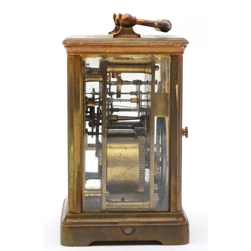 344 - A 20th century French brass corniche cased half hour striking carriage clock, the white dial with bl... 