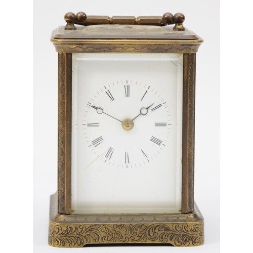 345 - A 20th century engraved brass cased hourly striking carriage clock, the white enamelled dial with bl... 