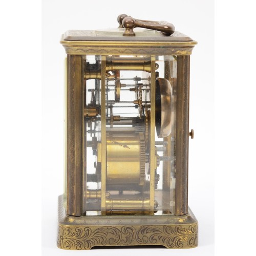 345 - A 20th century engraved brass cased hourly striking carriage clock, the white enamelled dial with bl... 