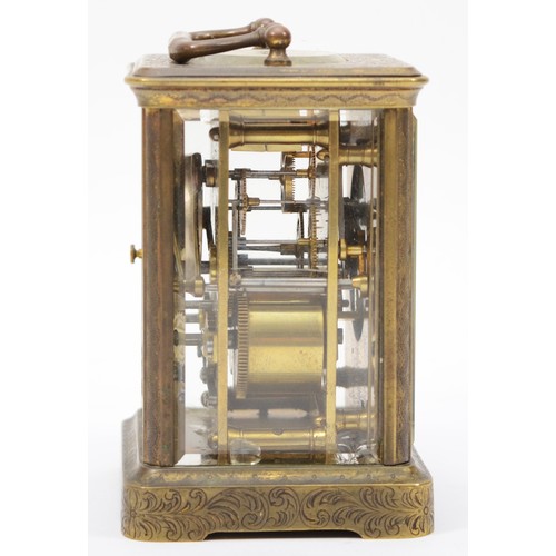 345 - A 20th century engraved brass cased hourly striking carriage clock, the white enamelled dial with bl... 