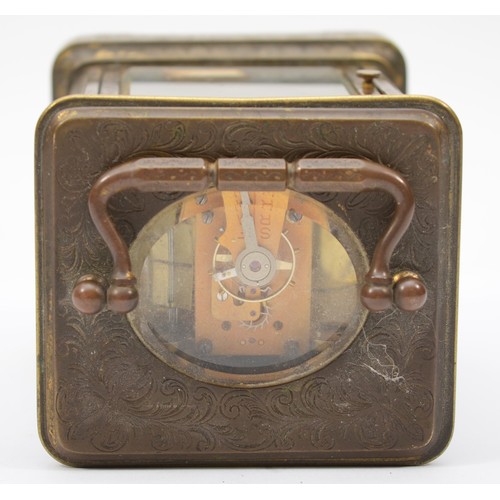 345 - A 20th century engraved brass cased hourly striking carriage clock, the white enamelled dial with bl... 