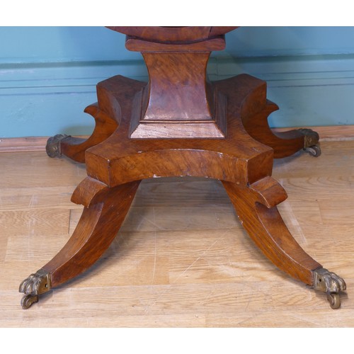 378 - An oak drop leaf sewing table, with two sets of drawers, raised on invert bow stretcher, standing on... 