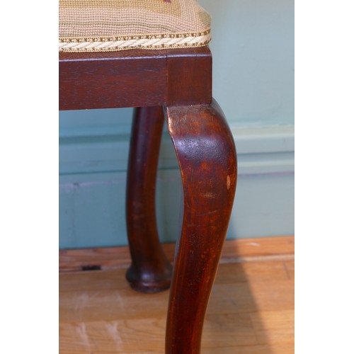 381 - An early 20th century mahogany framed stool with embroidered tapestry stuff over seat, raised on cab... 