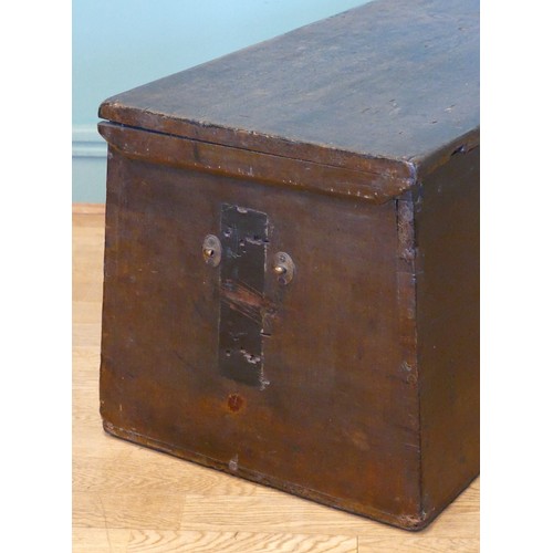 388 - A 19th/early 20th century stained pine tapering twin handled travelling trunk, the hinged lid openin... 