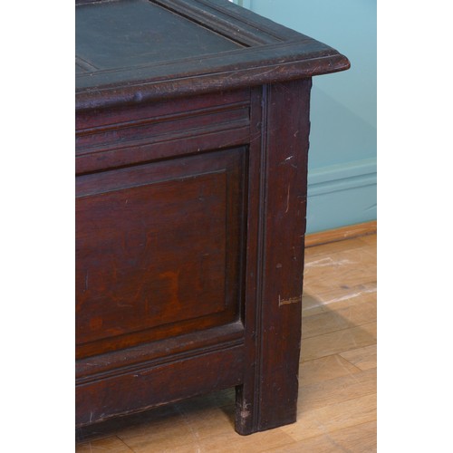 390 - A late 17th century and later oak three panel coffer, raised on stile supports 114 x 54 x 60cm.