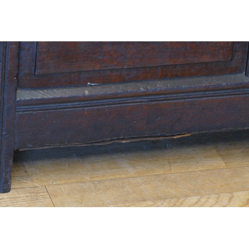 390 - A late 17th century and later oak three panel coffer, raised on stile supports 114 x 54 x 60cm.