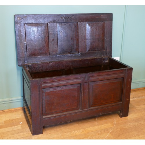 390 - A late 17th century and later oak three panel coffer, raised on stile supports 114 x 54 x 60cm.