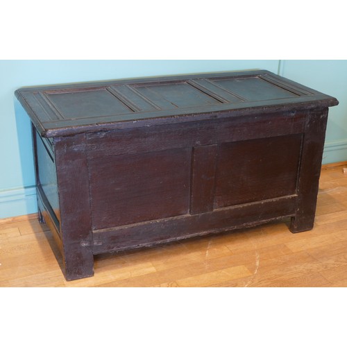 390 - A late 17th century and later oak three panel coffer, raised on stile supports 114 x 54 x 60cm.