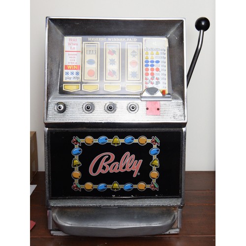 400 - Bally, an electromechanical three reel and hold slot machine, c.1965/70, 48 x 46 x 67cm, 2p play.
Pr... 