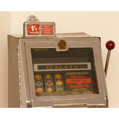 411 - Jennings Galaxy one arm bandit electromechanical three reel slot machine, c.1966, 1 shilling/5 new p... 